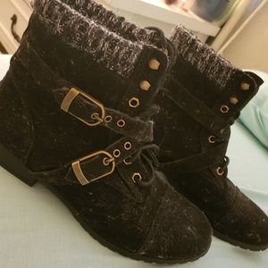 Black and grey flat ankle boots with buckl…